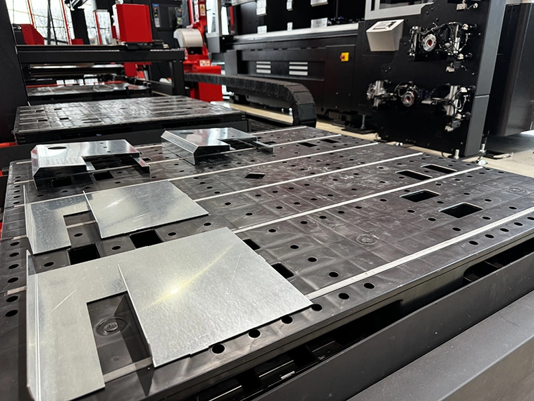 EGB ARse Electric Bending Press Machine with Completed Parts Loaded on Conveyor Tray