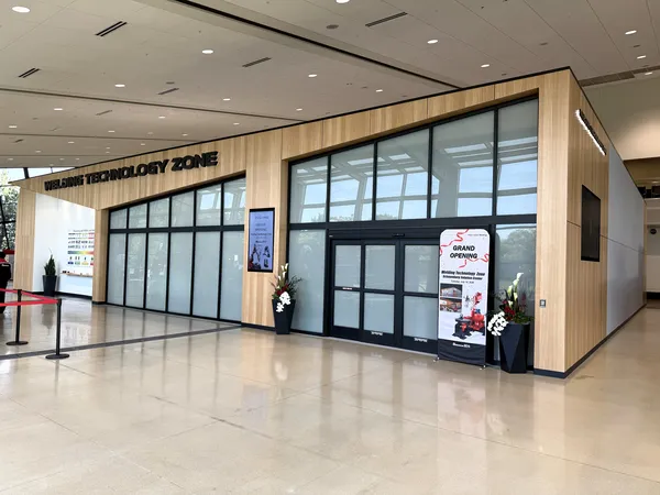 Welding Technology Zone entrance with grand opening signage